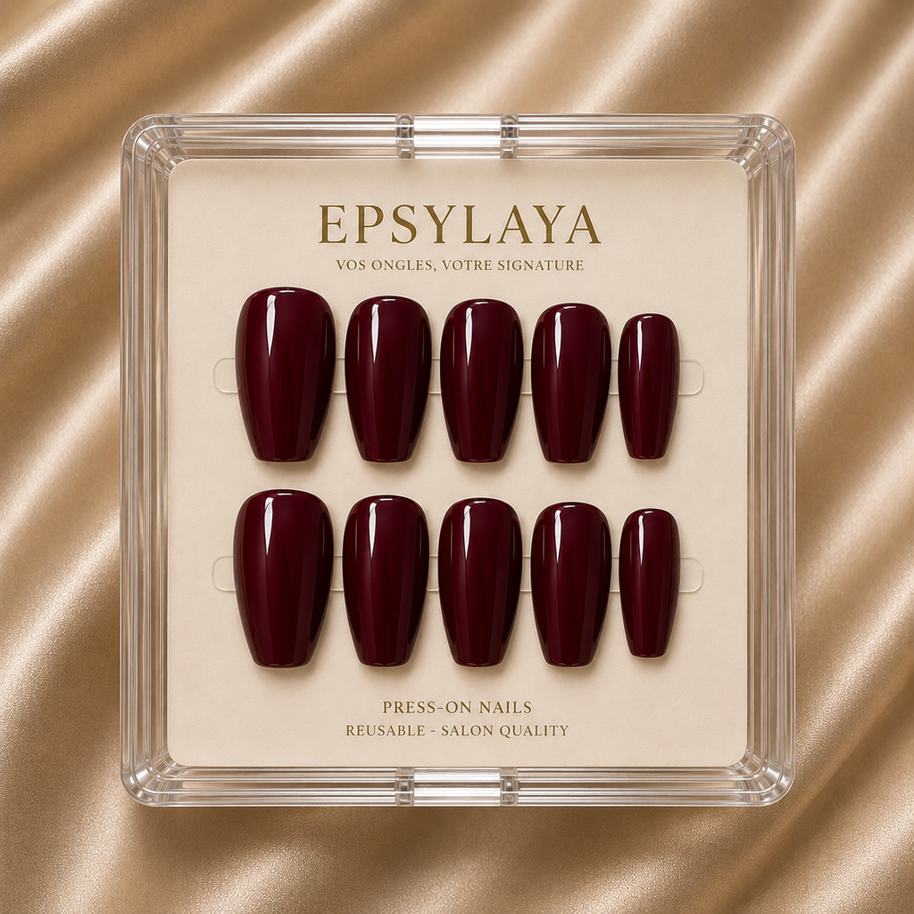 Press-on nails Bordeaux brillant posés sur la main, Epsylaya Suisse